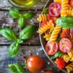 Fresh Tomato Basil Pasta in a rustic bowl with bright tomatoes and basil.
